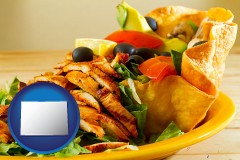 colorado map icon and a Mexican restaurant salad